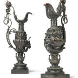 A LARGE PAIR OF FRENCH PATINATED-BRONZE EWERS - фото 1