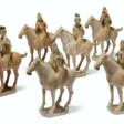 A GROUP OF SIX CHINESE PAINTED POTTERY FIGURES OF EQUESTRIAN... - Auction archive