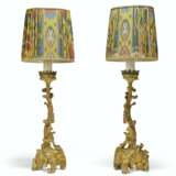 A PAIR OF ITALIAN PARCEL-GILT AND POLYCHROME-PAINTED PRICKET... - фото 1