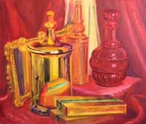 Golden vessel and red decanter.