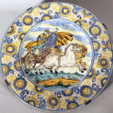 A Castelli majolica dish with wide border with coloured painted flowers, in the centre a charriot with horses and warrior, painted with blue borders - фото 1