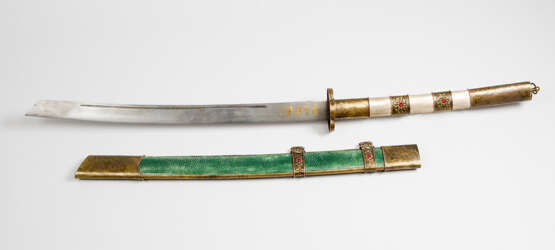 Chinese sword of a honorable person in bowed shape, the blade fluted and with gilded script sings and with damascene decorations - фото 1