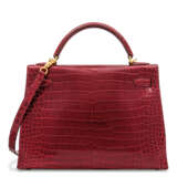 Hermes. A SHINY ROUGE H POROSUS CROCODILE SELLIER KELLY 32 WITH GOLD... - фото 3