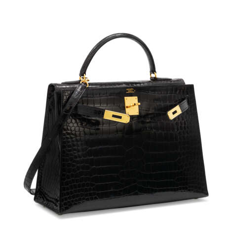 Hermes. A SHINY BLACK POROSUS CROCODILE SELLIER KELLY 32 WITH GOLD H... - Foto 2