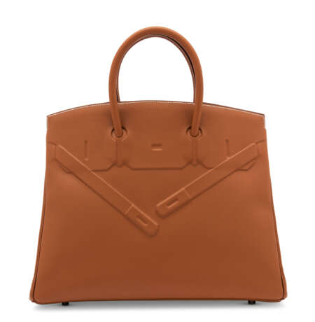 Hermes. A LIMITED EDITION GOLD EVERCALF LEATHER SHADOW BIRKIN 35 WIT... - Foto 1
