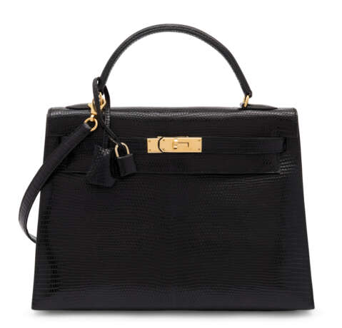 Hermes. A SHINY BLACK NILOTICUS LIZARD KELLY 32 WITH GOLD HARDWARE - photo 1