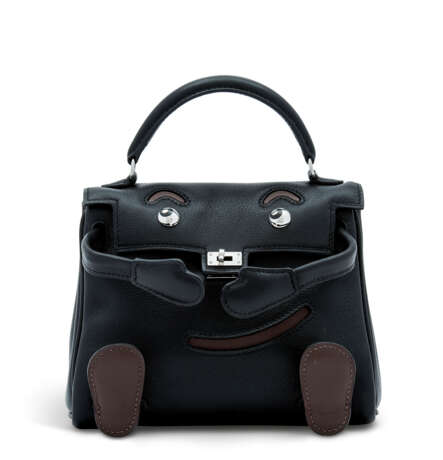 Hermes. A LIMITED EDITION BLACK SWIFT LEATHER QUELLE IDOLE WITH PALL... - фото 1