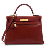 Hermes. A ROUGE H CALF BOX LEATHER RETOURNÉ KELLY 32 WITH GOLD HARDW... - Foto 1