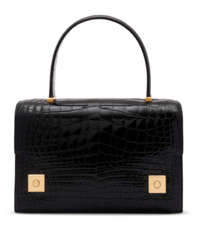 Hermes. A SHINY BLACK ALLIGATOR PIANO WITH GOLD HARDWARE - Foto 1