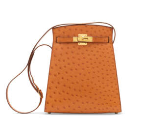 A COGNAC OSTRICH KELLY SPORT 24 BAG WITH GOLD HARDWARE