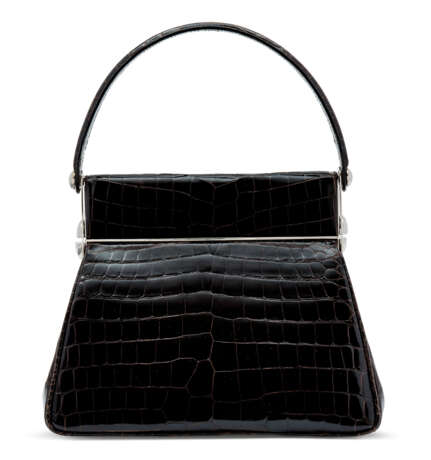 Christian Dior. A SHINY BROWN CROCODILE BABE VANITY BAG WITH SILVER HARDWARE... - photo 4