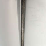 Bihänder or execution sword with long concave blade and maker‘s sign in the upper part - photo 1
