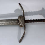 Bihänder or execution sword with long concave blade and maker‘s sign in the upper part - фото 2