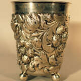 German large silver baker on three bowl feet and richly chased flower and leaves decorations - photo 1