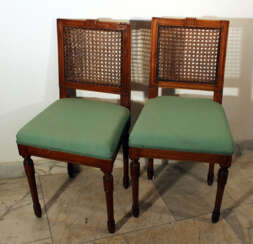A pair of Louis XVI dining chairs