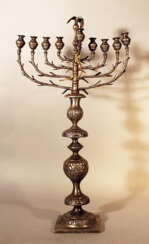 Polish Hanukkah lamp on quadratic base with richly shaped column, chased with flower decorations
