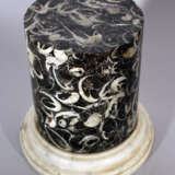A small column with fossil inclusions in black polished stone - фото 2