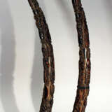 A pair of African horns with rich figural carvings on octagonal wooden bases - photo 2