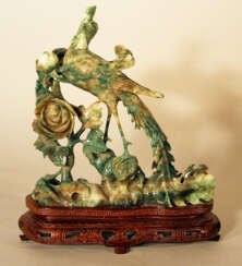Chinese jade bird sculpture with open work flowers on grey and green colours