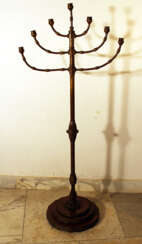 Jewish bronze Menorah with seven branches and spouts, on long column, in the centre with thicker ornament