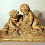 French sculpted terracotta group with two boys playing with water by a source, on integrated stepped base - фото 1