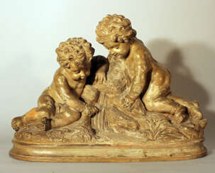 French sculpted terracotta group with two boys playing with water by a source, on integrated stepped base