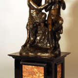 A French bronze group of Satyr and Pan playing the flute and sitting on a rock - photo 1