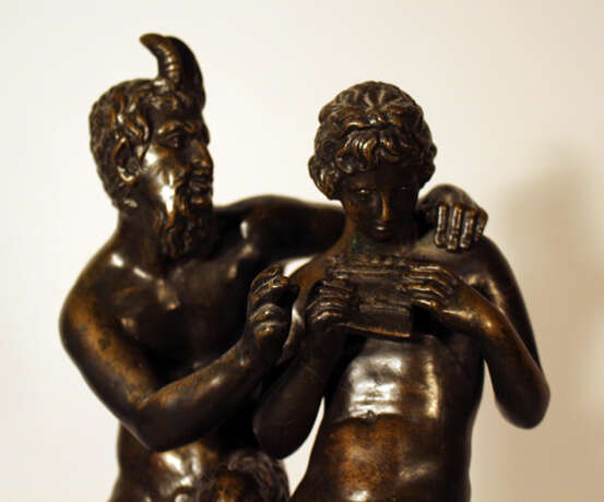 A French bronze group of Satyr and Pan playing the flute and sitting on a rock - фото 3