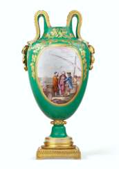 AN ORMOLU-MOUNTED SEVRES PORCELAIN GREEN GROUND TWO-HANDLED ...
