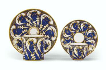 TWO SEVRES PORCELAIN BLEU TAILLANDIER GROUND CUPS AND SAUCER...