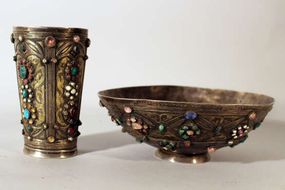 A Transylvanian baptism silver set comprising cylindrical baker in round shape with four fields, decorated with multicoloured stones and glasses, in shape of blossoms - photo 1