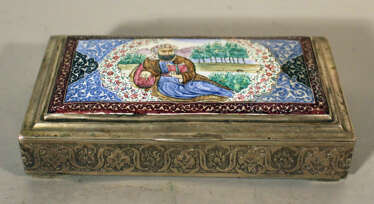 A Persian silver box in rectangular shape with engraved flowers on the sides