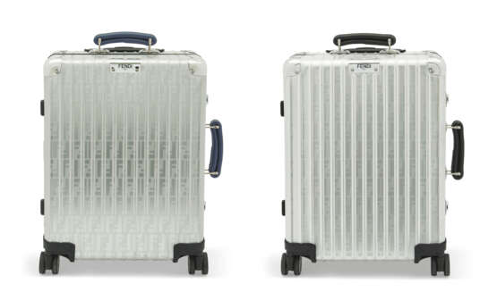 Fendi. A SET OF TWO: LIMITED EDITION ALUMINIUM & LEATHER CABIN SUIT... - Foto 1