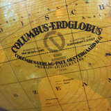 Library geographical globe with upstanding hightened mountain areas, with rivers and sea currents - photo 2