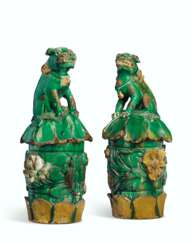 A PAIR OF CHINESE GREEN AND AMBER GLAZED LARGE ARCHITECTURAL...