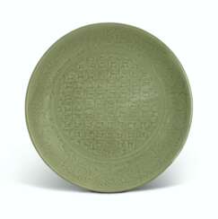 A CHINESE CARVED LONGQUAN CELADON DISH