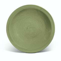 A CHINESE MOLDED LONGQUAN CELADON DISH