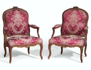 A PAIR OF LATE LOUIS XV BEECHWOOD FAUTEUILS
