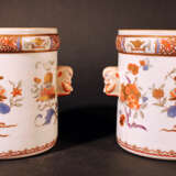 A pair of Compagnie des Indes porcelain pots, cylindrical shape with two grimaces faces on the sides - фото 1