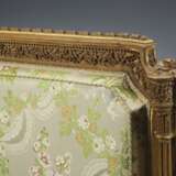 A PAIR OF LOUIS XVI BEECHWOOD AND PARCEL-GILT CANAPES - photo 2
