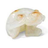 A SMALL CHINESE WHITE JADE DOG CARVING - photo 1
