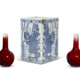 PAIR OF CHINESE PORCELAIN COPPER-RED GLAZED SMALL BOTTLE VASES, AND A CHINESE BLUE AND WHITE PORCELAIN PILLOW - фото 4