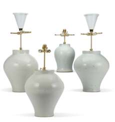 THREE WHITE CELADON-GLAZED VASES MOUNTED AS LAMPS