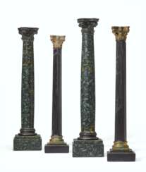TWO PAIRS OF ITALIAN MARBLE COLUMNS AND AN ORMOLU FIGURE OF A YOUNG BACCHUS