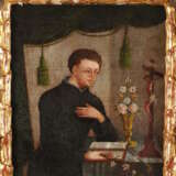 Geistlicher im Gebet - Foto 2