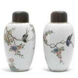 A SMALL MATCHED PAIR OF FAMILLE VERTE 'BIRD, BUTTERFLY AND PRUNUS' OVOID VASES - photo 1