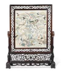 AN EMBROIDERED SILK 'HUNDRED BIRDS' PANEL INSET INTO A HARDWOOD SCREEN