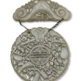 A PALE CELADON JADE RETICULATED TWO-PART HANGING PENDANT - photo 3