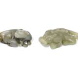A YELLOW JADE CARVING OF A MYTHICAL BEAST AND A GREENISH-WHITE JADE 'FELINE' GROUP - photo 1