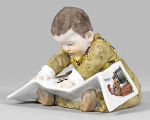 Sitzendes Kind mit Bilderbuch